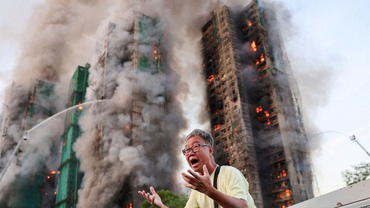 হংকংয়ের তাই পো অগ্নিকাণ্ড: শ্রমিকদের ধূমপানের ভাইরাল ফুটেজে তোলপাড় গোটা বিশ্ব!